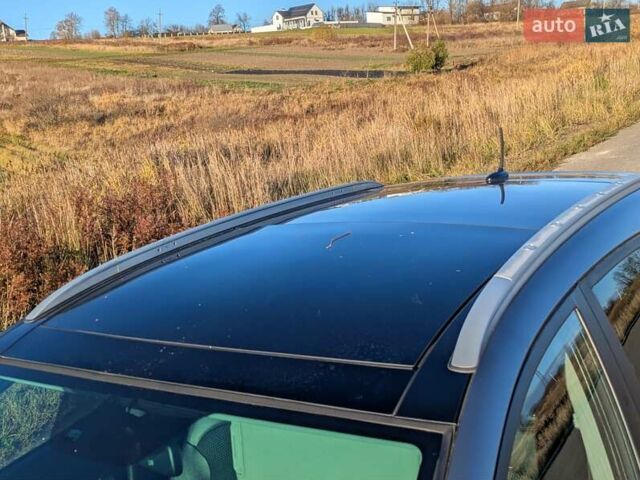 Сірий Хендай іх35, об'ємом двигуна 2 л та пробігом 175 тис. км за 10900 $, фото 5 на Automoto.ua