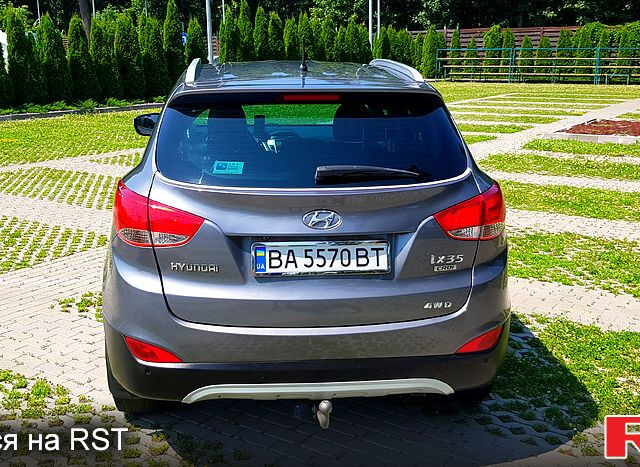 Сірий Хендай іх35, об'ємом двигуна 2 л та пробігом 235 тис. км за 11100 $, фото 4 на Automoto.ua