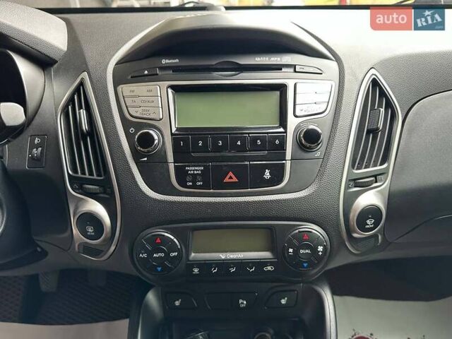 Сірий Хендай іх35, об'ємом двигуна 2 л та пробігом 176 тис. км за 11500 $, фото 12 на Automoto.ua