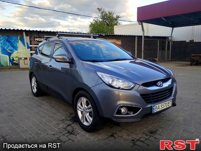 Сірий Хендай іх35, об'ємом двигуна 2 л та пробігом 230 тис. км за 11750 $, фото 1 на Automoto.ua