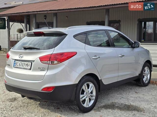 Сірий Хендай іх35, об'ємом двигуна 1.69 л та пробігом 308 тис. км за 11999 $, фото 7 на Automoto.ua