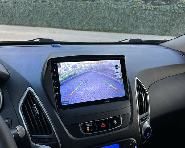 Сірий Хендай іх35, об'ємом двигуна 2 л та пробігом 190 тис. км за 12500 $, фото 11 на Automoto.ua