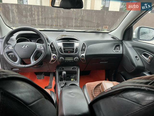 Сірий Хендай іх35, об'ємом двигуна 2 л та пробігом 156 тис. км за 9500 $, фото 6 на Automoto.ua
