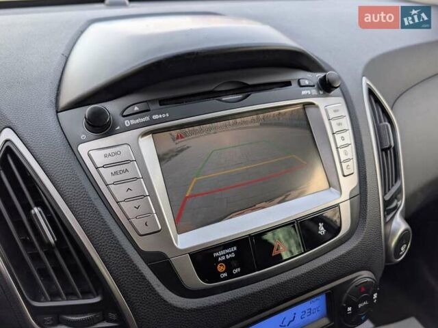 Сірий Хендай іх35, об'ємом двигуна 2 л та пробігом 222 тис. км за 13950 $, фото 67 на Automoto.ua