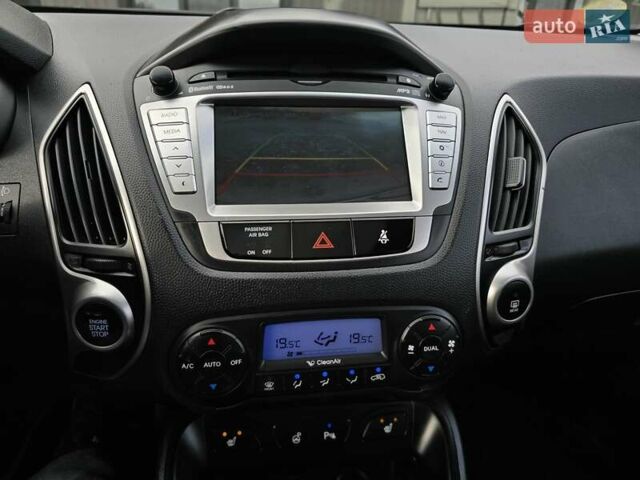 Сірий Хендай іх35, об'ємом двигуна 1.69 л та пробігом 308 тис. км за 11999 $, фото 17 на Automoto.ua