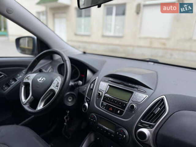 Сірий Хендай іх35, об'ємом двигуна 1.7 л та пробігом 209 тис. км за 11799 $, фото 5 на Automoto.ua