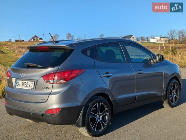 Сірий Хендай іх35, об'ємом двигуна 2 л та пробігом 175 тис. км за 10900 $, фото 27 на Automoto.ua