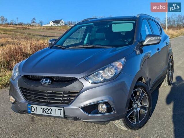 Сірий Хендай іх35, об'ємом двигуна 2 л та пробігом 175 тис. км за 10900 $, фото 7 на Automoto.ua