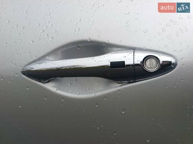 Сірий Хендай іх35, об'ємом двигуна 2 л та пробігом 240 тис. км за 11900 $, фото 6 на Automoto.ua