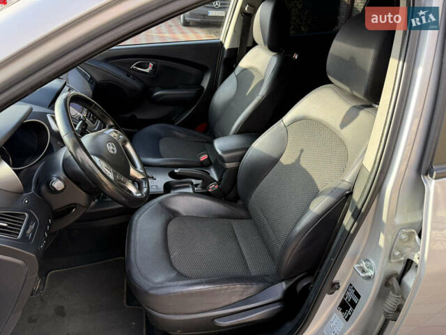 Сірий Хендай іх35, об'ємом двигуна 2 л та пробігом 212 тис. км за 11950 $, фото 22 на Automoto.ua
