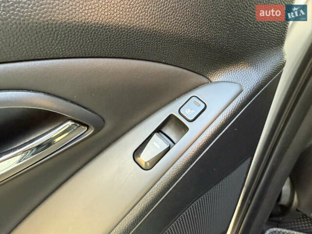 Сірий Хендай іх35, об'ємом двигуна 2 л та пробігом 212 тис. км за 11950 $, фото 28 на Automoto.ua