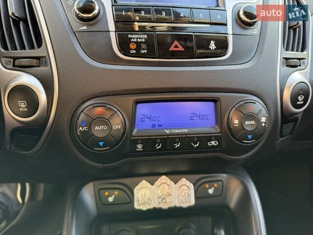 Сірий Хендай іх35, об'ємом двигуна 2 л та пробігом 212 тис. км за 11950 $, фото 17 на Automoto.ua