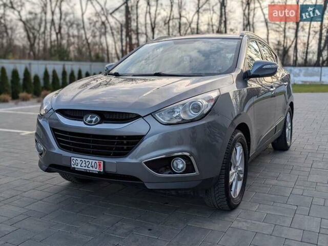 Сірий Хендай іх35, об'ємом двигуна 2 л та пробігом 222 тис. км за 13950 $, фото 1 на Automoto.ua