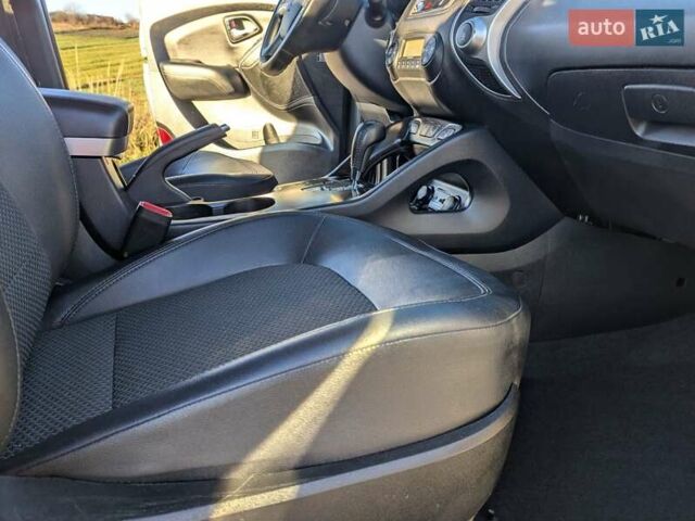 Сірий Хендай іх35, об'ємом двигуна 2 л та пробігом 175 тис. км за 10900 $, фото 49 на Automoto.ua