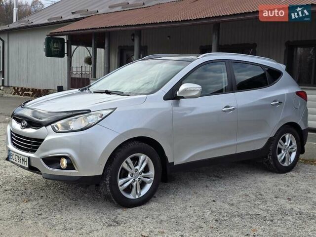 Сірий Хендай іх35, об'ємом двигуна 1.69 л та пробігом 308 тис. км за 11999 $, фото 4 на Automoto.ua