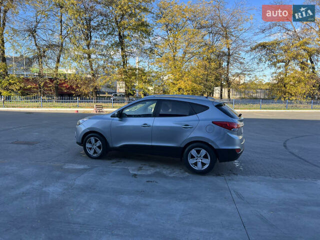 Сірий Хендай іх35, об'ємом двигуна 2 л та пробігом 156 тис. км за 11999 $, фото 9 на Automoto.ua