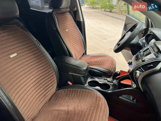 Сірий Хендай іх35, об'ємом двигуна 2 л та пробігом 156 тис. км за 11999 $, фото 16 на Automoto.ua