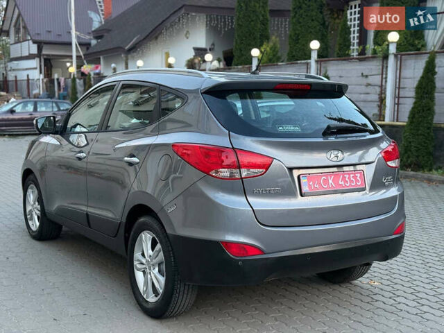 Сірий Хендай іх35, об'ємом двигуна 1.7 л та пробігом 209 тис. км за 11799 $, фото 1 на Automoto.ua