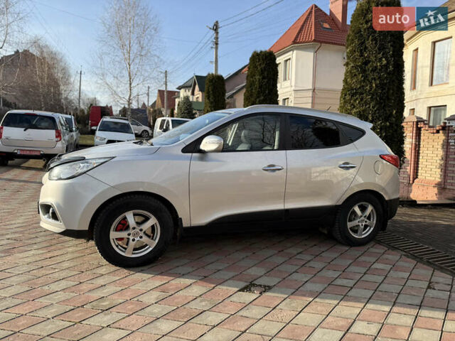 Сірий Хендай іх35, об'ємом двигуна 2 л та пробігом 212 тис. км за 11950 $, фото 9 на Automoto.ua