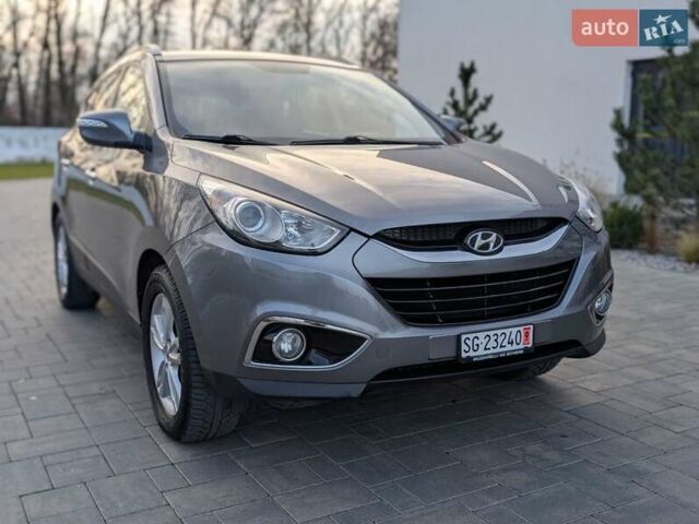 Сірий Хендай іх35, об'ємом двигуна 2 л та пробігом 222 тис. км за 13950 $, фото 3 на Automoto.ua