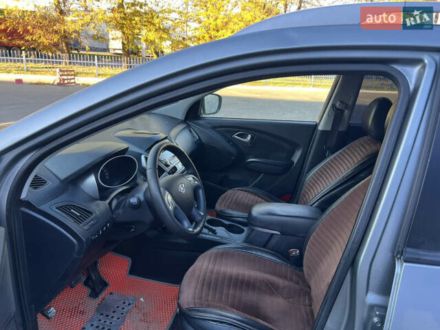Сірий Хендай іх35, об'ємом двигуна 2 л та пробігом 156 тис. км за 11999 $, фото 17 на Automoto.ua