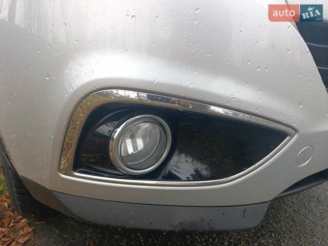 Сірий Хендай іх35, об'ємом двигуна 2 л та пробігом 240 тис. км за 11900 $, фото 16 на Automoto.ua