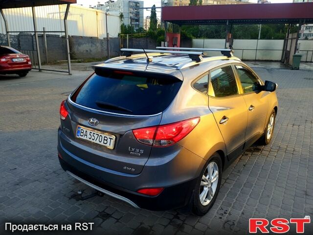 Сірий Хендай іх35, об'ємом двигуна 2 л та пробігом 230 тис. км за 11750 $, фото 5 на Automoto.ua