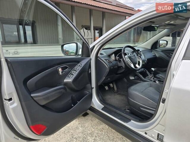Сірий Хендай іх35, об'ємом двигуна 1.69 л та пробігом 308 тис. км за 11999 $, фото 11 на Automoto.ua