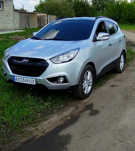 Сірий Хендай іх35, об'ємом двигуна 2 л та пробігом 97 тис. км за 12999 $, фото 1 на Automoto.ua