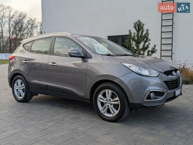 Сірий Хендай іх35, об'ємом двигуна 2 л та пробігом 222 тис. км за 13950 $, фото 5 на Automoto.ua