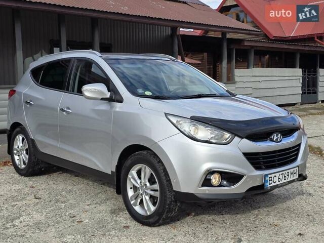 Сірий Хендай іх35, об'ємом двигуна 1.69 л та пробігом 308 тис. км за 11999 $, фото 1 на Automoto.ua