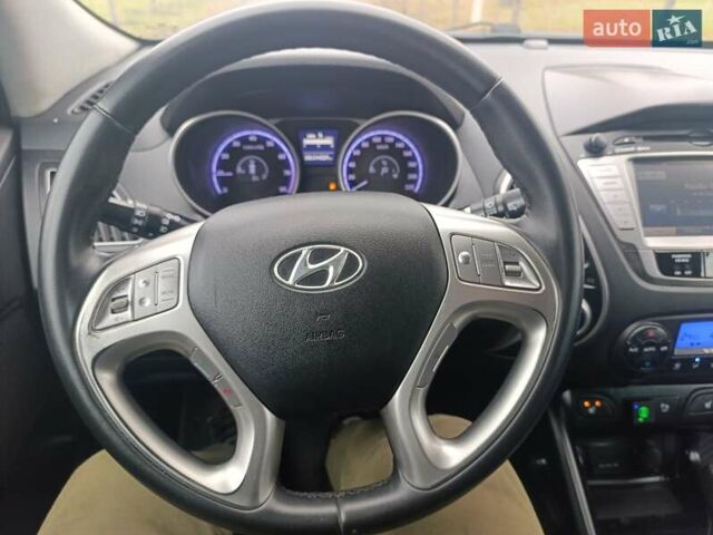 Сірий Хендай іх35, об'ємом двигуна 2 л та пробігом 240 тис. км за 11900 $, фото 1 на Automoto.ua