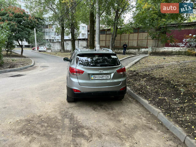 Сірий Хендай іх35, об'ємом двигуна 2 л та пробігом 156 тис. км за 11999 $, фото 7 на Automoto.ua