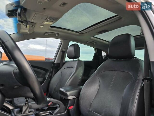 Сірий Хендай іх35, об'ємом двигуна 1.69 л та пробігом 308 тис. км за 11999 $, фото 13 на Automoto.ua