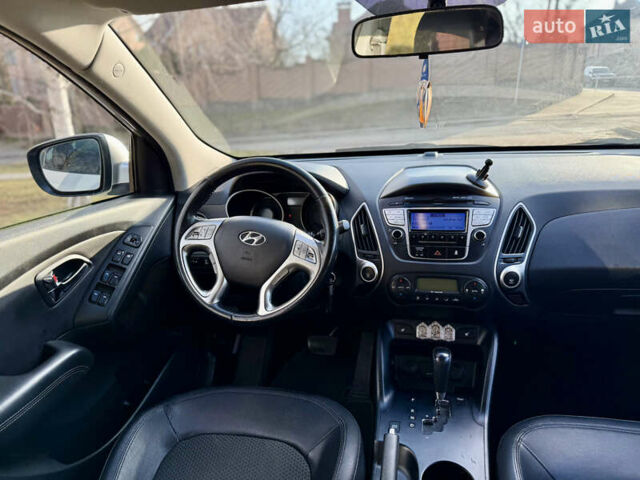 Сірий Хендай іх35, об'ємом двигуна 2 л та пробігом 212 тис. км за 11950 $, фото 12 на Automoto.ua