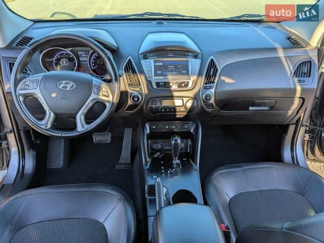 Сірий Хендай іх35, об'ємом двигуна 2 л та пробігом 175 тис. км за 10900 $, фото 35 на Automoto.ua