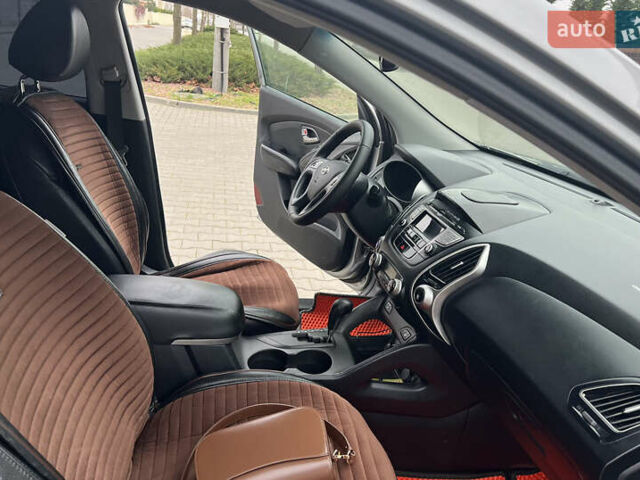 Сірий Хендай іх35, об'ємом двигуна 2 л та пробігом 156 тис. км за 9500 $, фото 4 на Automoto.ua