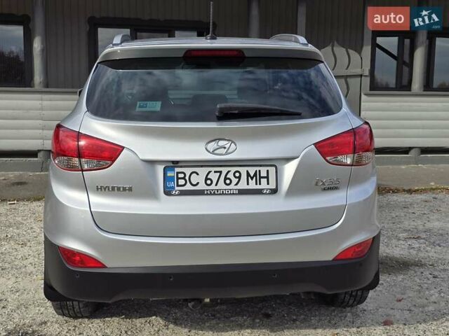Сірий Хендай іх35, об'ємом двигуна 1.69 л та пробігом 308 тис. км за 11999 $, фото 6 на Automoto.ua