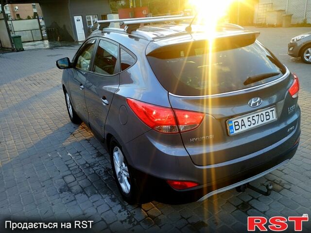 Сірий Хендай іх35, об'ємом двигуна 2 л та пробігом 230 тис. км за 11750 $, фото 6 на Automoto.ua