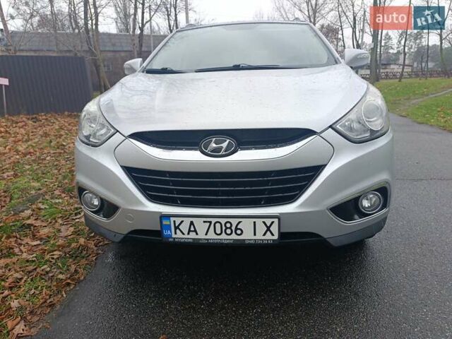 Сірий Хендай іх35, об'ємом двигуна 2 л та пробігом 240 тис. км за 11900 $, фото 17 на Automoto.ua
