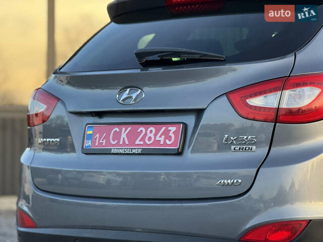 Сірий Хендай іх35, об'ємом двигуна 2 л та пробігом 230 тис. км за 14450 $, фото 21 на Automoto.ua