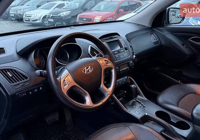 Сірий Хендай іх35, об'ємом двигуна 2 л та пробігом 240 тис. км за 13000 $, фото 14 на Automoto.ua