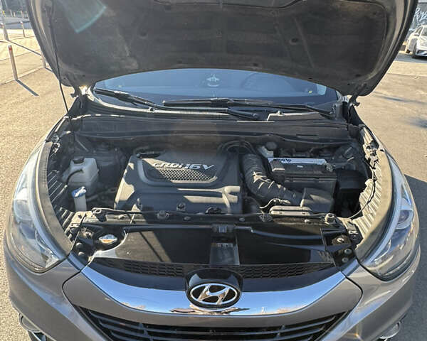 Сірий Хендай іх35, об'ємом двигуна 2 л та пробігом 121 тис. км за 13500 $, фото 28 на Automoto.ua