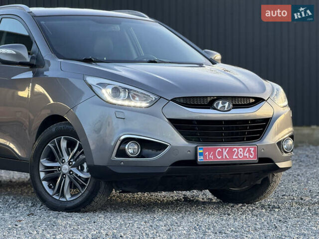 Сірий Хендай іх35, об'ємом двигуна 2 л та пробігом 230 тис. км за 14450 $, фото 4 на Automoto.ua
