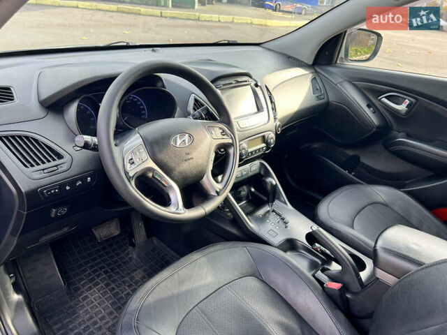 Сірий Хендай іх35, об'ємом двигуна 2 л та пробігом 178 тис. км за 11999 $, фото 6 на Automoto.ua