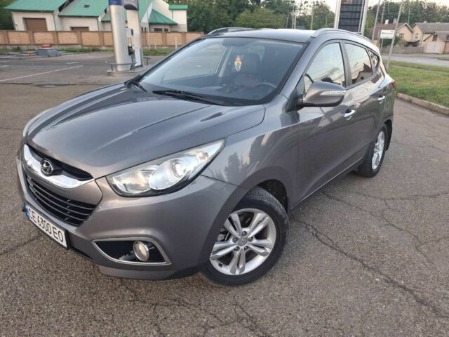 Сірий Хендай іх35, об'ємом двигуна 2 л та пробігом 230 тис. км за 13300 $, фото 5 на Automoto.ua