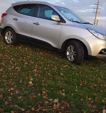 Сірий Хендай іх35, об'ємом двигуна 2 л та пробігом 208 тис. км за 14750 $, фото 5 на Automoto.ua