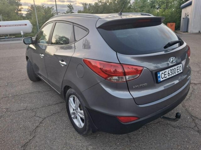 Сірий Хендай іх35, об'ємом двигуна 2 л та пробігом 230 тис. км за 13300 $, фото 6 на Automoto.ua