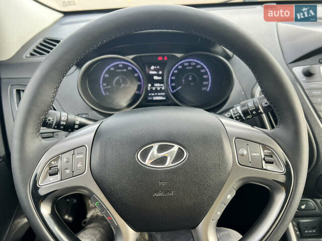 Сірий Хендай іх35, об'ємом двигуна 2 л та пробігом 178 тис. км за 11999 $, фото 14 на Automoto.ua