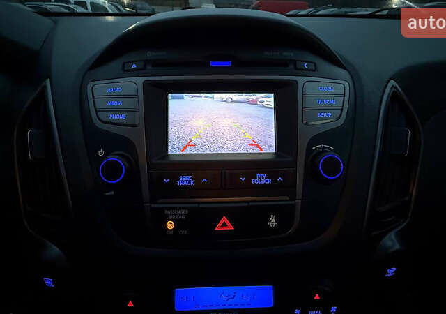 Сірий Хендай іх35, об'ємом двигуна 2 л та пробігом 240 тис. км за 13000 $, фото 20 на Automoto.ua